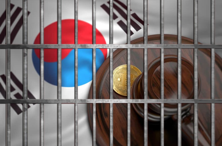 Bitcoin and judge gavel laying on Korean flag - Financial Futurism - Bosses of Fraudulent South Korean Crypto Exchange V Global Jailed -
